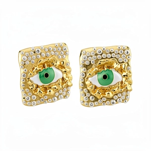 Vintage gold rectangular stud earrings with green evil eye and rhinestone details