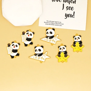 Detailed view of cute panda enamel charms for DIY jewelry making and pendants
