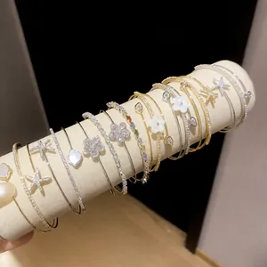 Zircon mother-of-pearl flower double-layer open bangles in gold and silver finish