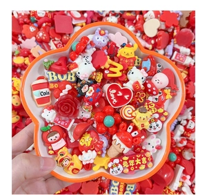 Macro detail of assorted colorful resin cartoon charms and festive DIY craft accessories