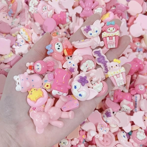 Mix of colorful resin cartoon DIY charms in pink pastel tones for crafts and accessories