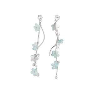 Elegant silver-tone tassel earrings with light blue resin flowers and CZ stones.