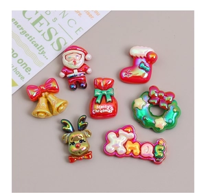 Detailed view of colorful iridescent Christmas resin cabochons with metallic aurora finish
