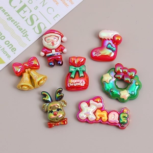 7pcs holographic Christmas resin flatback charms including Santa, bell and reindeer