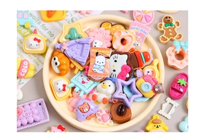 Close-up of colorful resin Sanrio-themed charms for DIY crafts and hair accessories