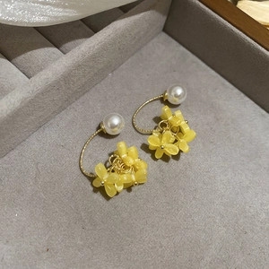 Elegant yellow flower petal earrings with white pearls and golden curved hooks