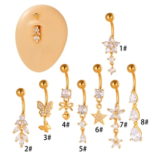 Gold-plated stainless steel belly button rings with cubic zirconia charms and tassels