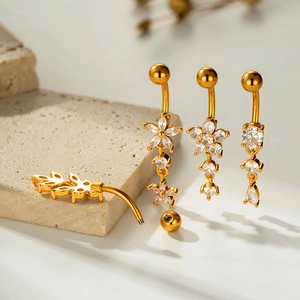 Gold plated stainless steel belly rings set with sparkling zircon flower tassel charms