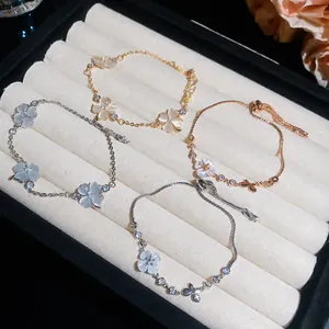 Elegante Katzenaugenstein-Blumenarmbänder mit Zirkon-Akzenten in Gold und Silber.