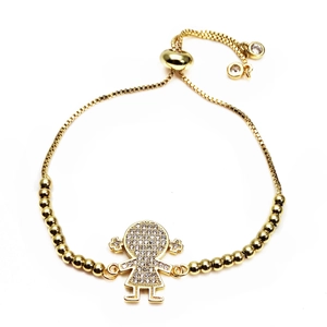 Detail of adjustable gold bracelet with pave zircon girl charm and box chain slide