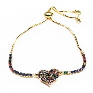 Close-up of heart charm with colorful pavé stones on gold-tone adjustable box chain