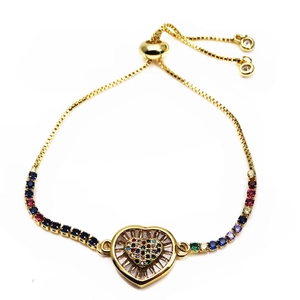 Close-up of heart-shaped charm bracelet with colorful zircons and adjustable slider