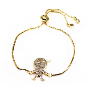 Detail of gold box chain bracelet with micro-pave zircon boy pendant and adjustable closure