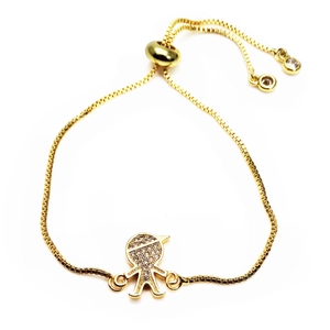 Detail of adjustable box chain bracelet featuring a zircon-inlaid boy charm in gold finish