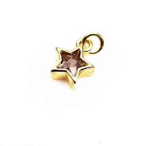 Detailed macro view of 14K gold-plated star pendant with inlaid purple zircon crystal