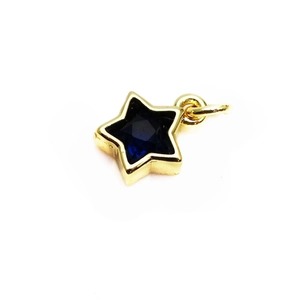 Detail of 14K gold plated star charm with deep blue zircon inlay for DIY jewelry