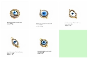 Detailed close-up of shell and cubic zirconia evil eye charms with copper plating