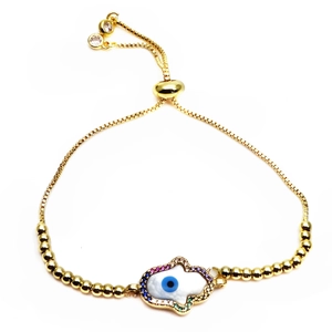 Detailed close-up of golden Hamsa hand bracelet with zircon evil eye and adjustable clasp