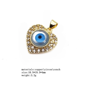 Golden heart pendant with shell evil eye and pavé zircon, dimensions 18.5x19.5mm