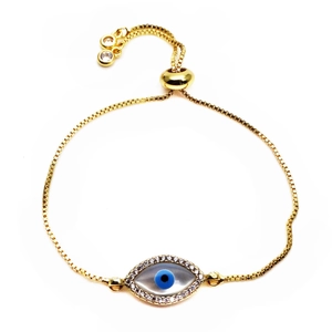 Detailed view of evil eye bracelet with blue zircon and adjustable gold bolo chain