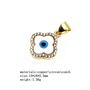 Detail view of evil eye clover pendant with zircon inlay and product dimensions