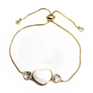 Detail of adjustable gold-plated box chain with zircon heart and white center charm