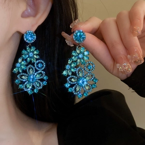 Elegant blue rhinestone floral drop earrings with a sophisticated vintage bohemian aesthetic