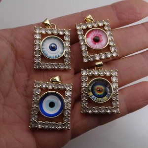Handheld square evil eye pendants in gold plating with cubic zirconia micro-pave setting