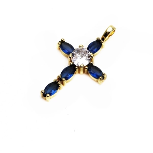 Gold cross pendant featuring blue marquise stones and a central white cubic zirconia