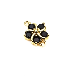 Detailed view of 10mm gold flower connector with black zircons for DIY jewelry making