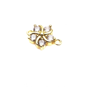 Macro shot of 10mm flower connector with cubic zirconia and double loops for DIY jewelry