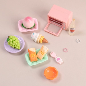 Miniature kitchen food play set with pink toy oven and assorted resin dessert accessories