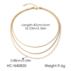 Macro detail showing measurements for a triple-layer 18k gold plated stainless steel necklace.