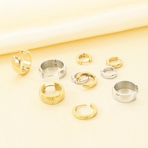 Detailed view of polished stainless steel hoop earrings in various sizes and finishes.