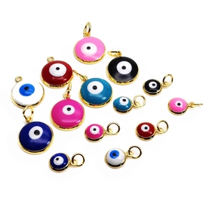 Colorful Evil Eye enamel charms in various sizes with gold-plated metal frames