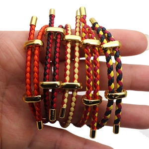 Detail of 3mm braided cords with gold U-shaped metal buckle in multiple vibrant colors