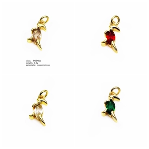 Detailed view of four colorful zircon bird pendants in gold plated copper for DIY jewelry