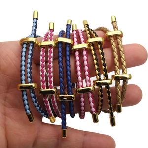 Detailed view of colorful 3mm braided leather cord bracelets with adjustable gold clasps
