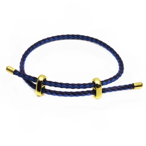 Detail of 3mm braided leather cord bracelet with gold adjustable loops and dual-tone texture