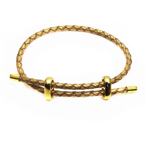 Macro detail of adjustable 3mm leather braided bracelet with gold sliding metal buckles