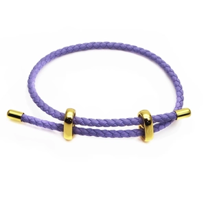 Detailed view of purple braided leather cord bracelet with adjustable gold metal sliders