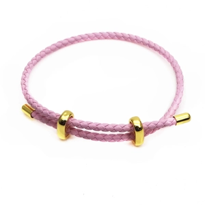 Detailed view of pink woven 3mm leather bracelet with adjustable golden ring sliders
