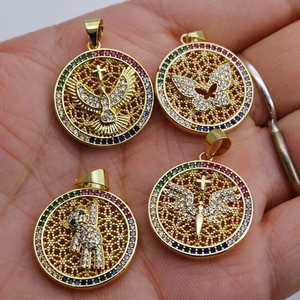 Gold round pendant set with micro-pave zircons featuring butterfly and angel motifs