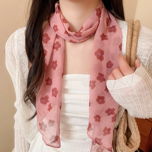 Elegant pink floral mesh scarf ribbon worn as a chic summer neck accessory for women.