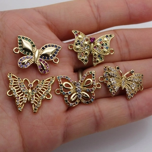Five gold butterfly connectors with micro-set zircons for DIY jewelry making