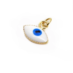 Macro detail of 10mm evil eye charm with blue enamel inlay and gold textured frame