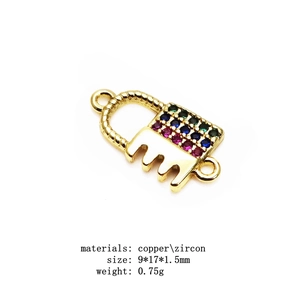 Detailed macro of gold copper lock connector with colorful micro-paved zircon stones