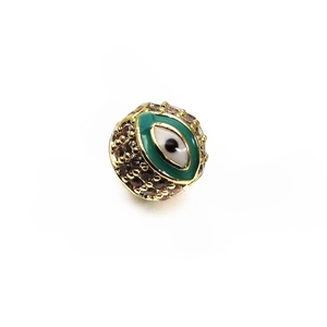 Macro shot of 14K gold plated Evil Eye bead charm with micro-p镶 inlaid crystal details