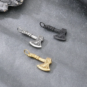 Nordic Viking battle axe pendants set in gold, silver, and black stainless steel finish.