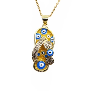 Gold flip flop pendant necklace with yellow enamel evil eye and sparkling crystals